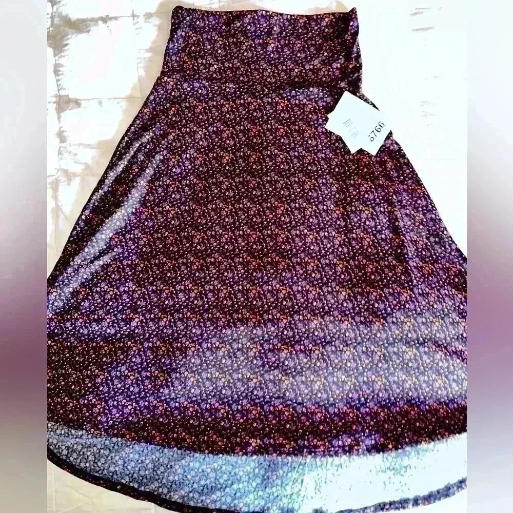 Lularoe Xs black ditzy floral‎ Azure A-line skirt . Pink, black ,gold & blue